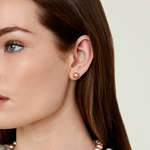 8mm Pink Freshwater Round Pearl Stud Earrings - Model Image